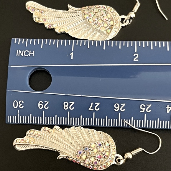 Beautiful Angel wing earrings. White and silver. 2 1/4” drop. New. - Picture 13 of 13